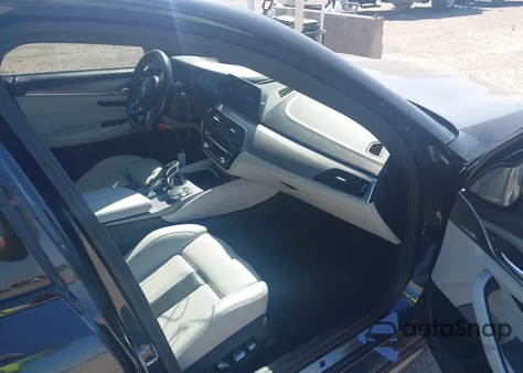 2018 BMW M5 z USA, uszkodzony, nr VIN WBSJF0C54JB282104